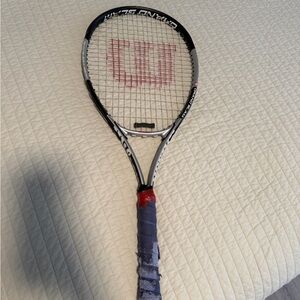 Wilson Tennis Racket with Red and Black Accents